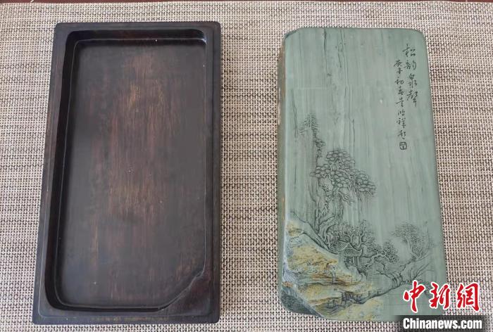 圖為盧保勝為提升洮硯文化內(nèi)涵，制作“一硯一銘、一盒一拓”成品展示?！堟?攝