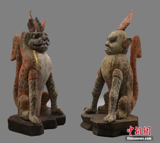 圖為慕容智墓出土鎮(zhèn)墓獸。 中新社發(fā) 甘肅省文物局 供圖